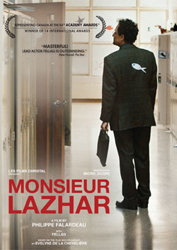 The main character of the film Monsieur Lazhar standing with a folder in his hands