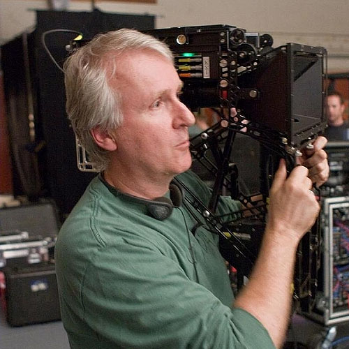 James Cameron holding a movie camera